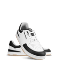 Barebarics Wave – White & Black Les Barebarics Wave White & Black associent un design intemporel à tous les avantages d'une véritable chaussure barefoot. Fabriquées en cuir Nappa premium, elles offrent un confort exceptionnel, une grande liberté de mouve - Pas Naturels