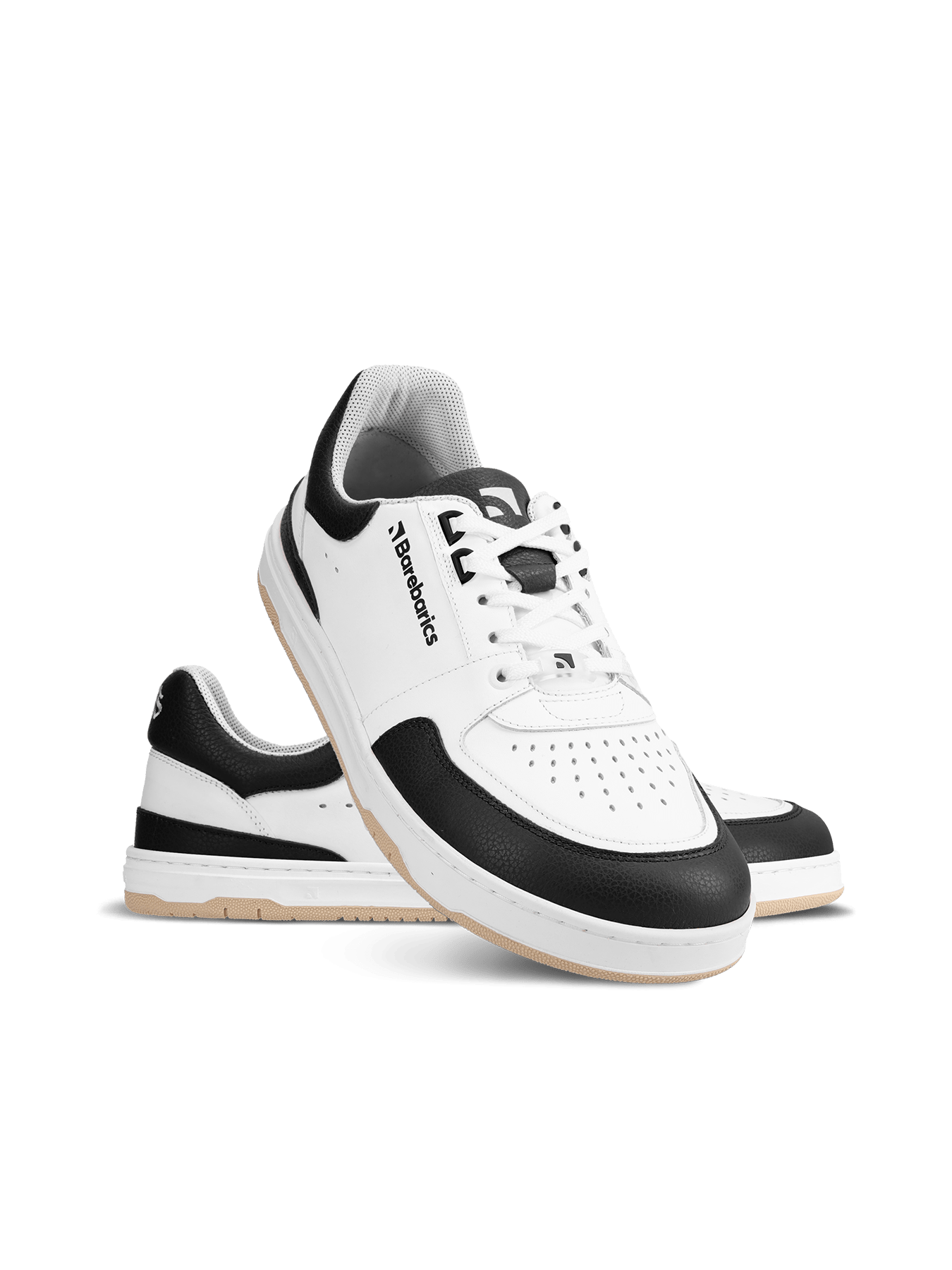 Barebarics Wave – White & Black Les Barebarics Wave White & Black associent un design intemporel à tous les avantages d'une véritable chaussure barefoot. Fabriquées en cuir Nappa premium, elles offrent un confort exceptionnel, une grande liberté de mouve - Pas Naturels