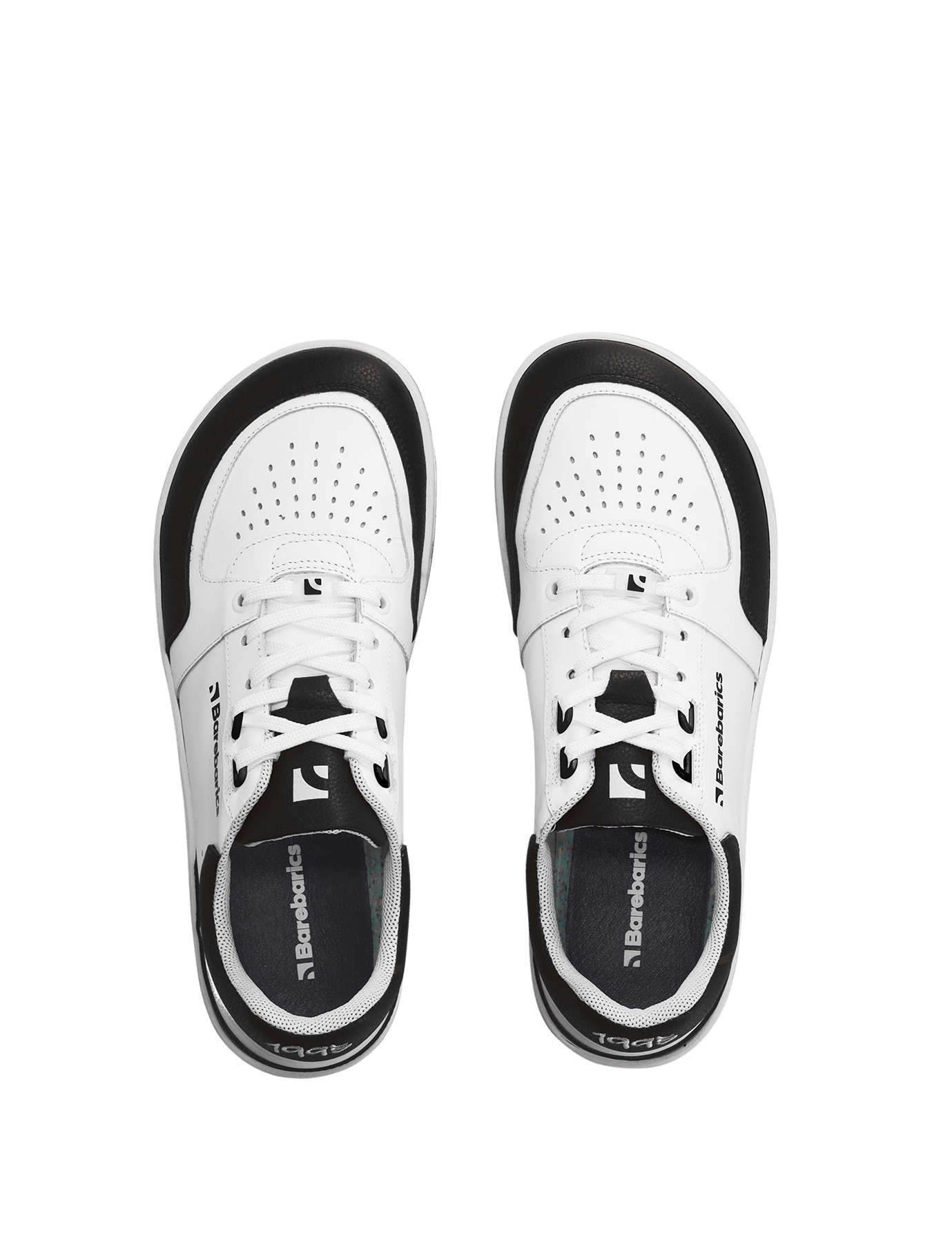 Barebarics Wave – White & Black Les Barebarics Wave White & Black associent un design intemporel à tous les avantages d'une véritable chaussure barefoot. Fabriquées en cuir Nappa premium, elles offrent un confort exceptionnel, une grande liberté de mouve - Pas Naturels