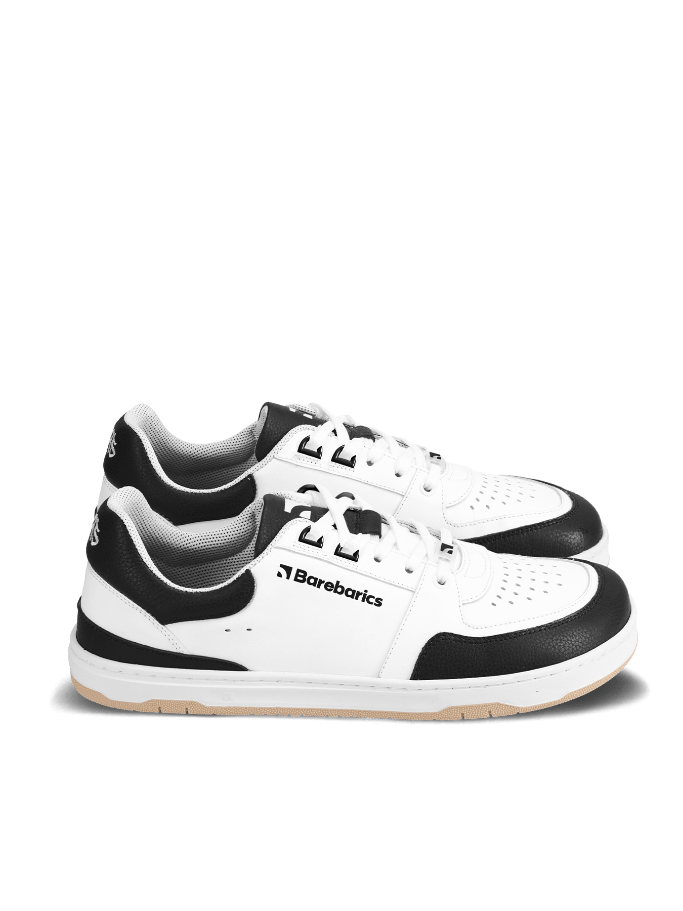Barebarics Wave – White & Black Les Barebarics Wave White & Black associent un design intemporel à tous les avantages d'une véritable chaussure barefoot. Fabriquées en cuir Nappa premium, elles offrent un confort exceptionnel, une grande liberté de mouve - Pas Naturels